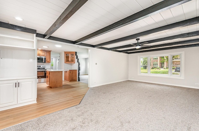 208 Webster Ln, Schaumburg, IL 60193 - unfurnished living room featuring light carpet, beamed ceiling, recessed lighting, ceiling fan, and light wood-style flooring