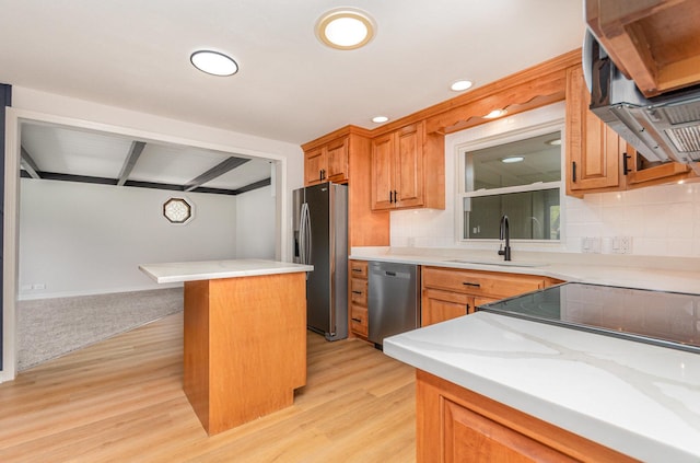 208 Webster Ln, Schaumburg, IL 60193 - kitchen with appliances with stainless steel finishes, tasteful backsplash, light wood-style flooring, a center island, and recessed lighting
