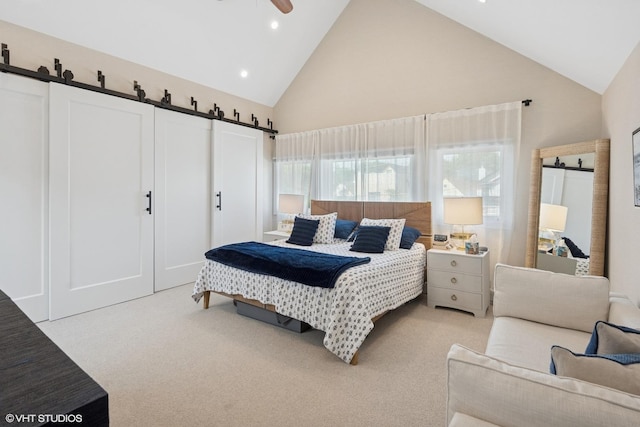 3444 N Hamilton Ave, Chicago, IL 60618 - bedroom featuring a barn door, high vaulted ceiling, light carpet, and recessed lighting