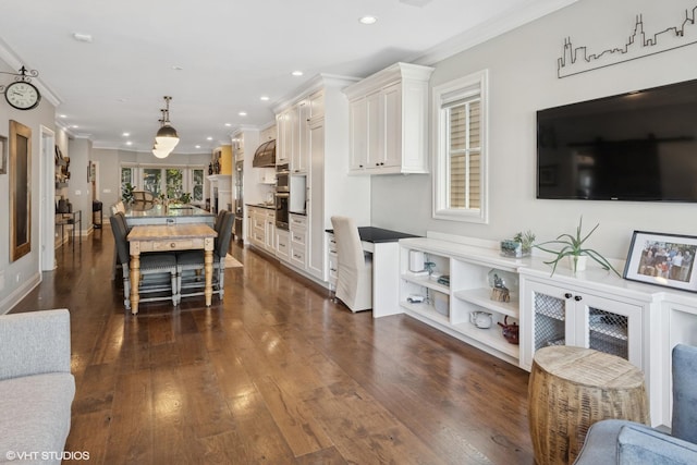 3444 N Hamilton Ave, Chicago, IL 60618 - kitchen featuring ornamental molding, white cabinetry, dark wood finished floors, recessed lighting, and pendant lighting