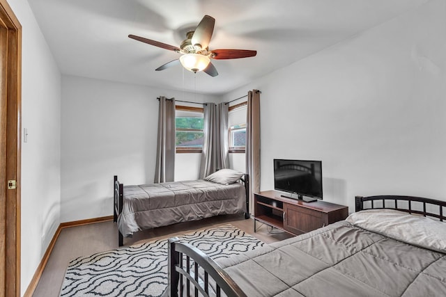 9226 S Utica Ave, Evergreen Park, IL 60805 - bedroom featuring a ceiling fan and baseboards