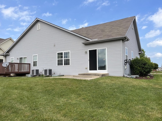 913 Yorktown St, Mchenry, IL 60050 - rear view of house featuring a yard, roof with shingles, and a deck