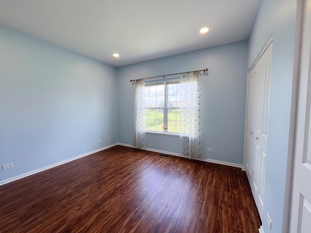 913 Yorktown St, Mchenry, IL 60050 - unfurnished room with dark wood-type flooring and recessed lighting