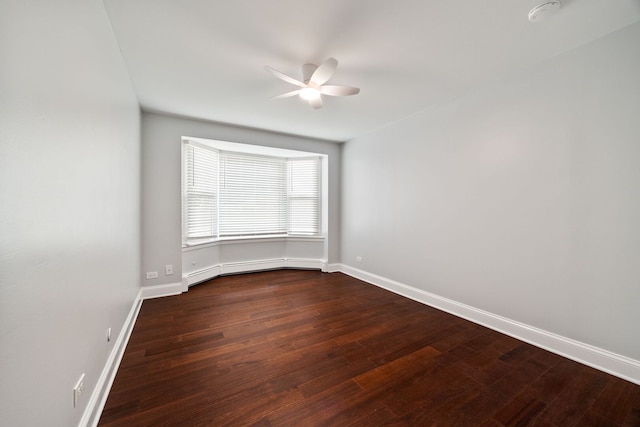 8232 Niles Center Rd Unit 101, Skokie, IL 60077 - spare room with a ceiling fan, dark wood-type flooring, and a smoke detector