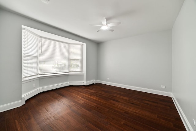 8232 Niles Center Rd Unit 101, Skokie, IL 60077 - empty room featuring ceiling fan, wood finished floors, and a baseboard heating unit