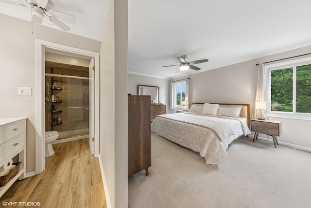 647 Farnham Ln, Wheaton, IL 60189 - bedroom featuring ornamental molding, ceiling fan, ensuite bathroom, and light wood-style floors