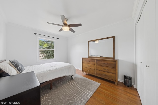 647 Farnham Ln, Wheaton, IL 60189 - bedroom with wood finished floors, crown molding, a closet, and ceiling fan