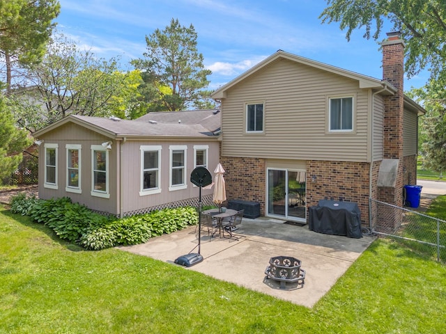 647 Farnham Ln, Wheaton, IL 60189 - rear view of property with a chimney, brick siding, and a patio area