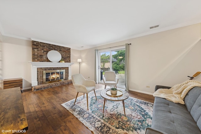 647 Farnham Ln, Wheaton, IL 60189 - living room featuring wood finished floors, ornamental molding, and a brick fireplace