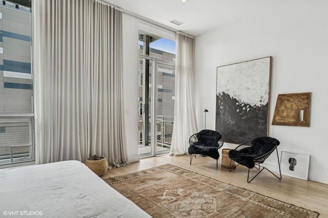 134 S Aberdeen Ave Unit 5S, Chicago, IL 60607 - bedroom with access to outside and wood finished floors