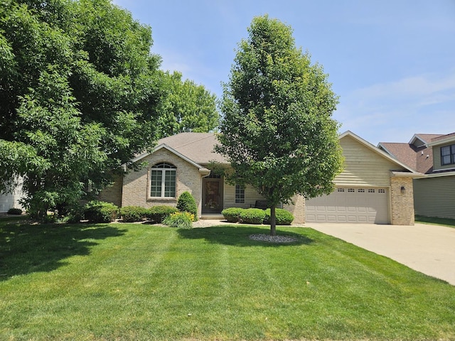 210 Barrington Dr, Bourbonnais, IL 60914 - view of front of home with a garage, a front yard, concrete driveway, and brick siding