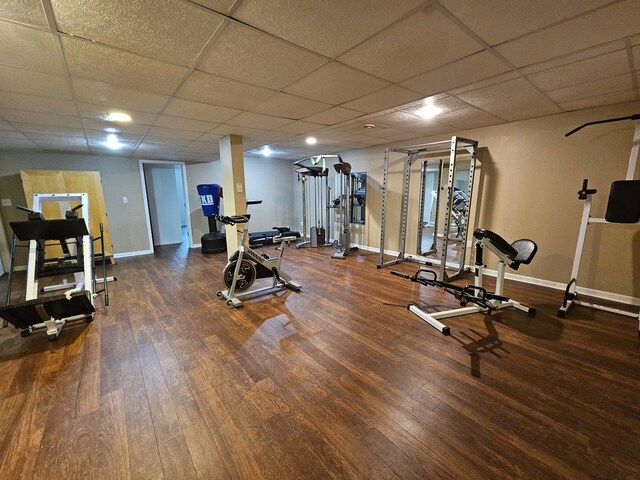 210 Barrington Dr, Bourbonnais, IL 60914 - exercise area with wood finished floors and a paneled ceiling