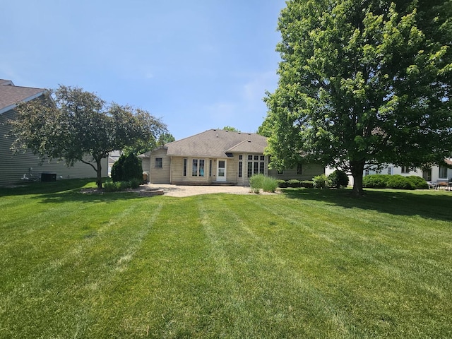 210 Barrington Dr, Bourbonnais, IL 60914 - rear view of property with a patio and a yard