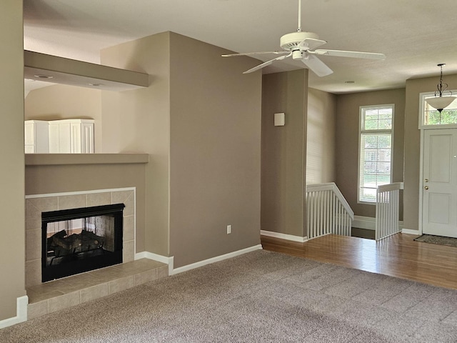 210 Barrington Dr, Bourbonnais, IL 60914 - unfurnished living room featuring carpet floors, ceiling fan, and a fireplace