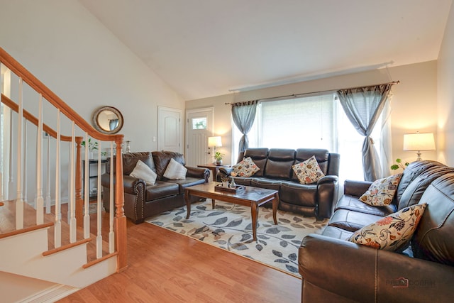 552 Arbor Gate Ln, Buffalo Grove, IL 60089 - living area with wood finished floors, stairway, and high vaulted ceiling