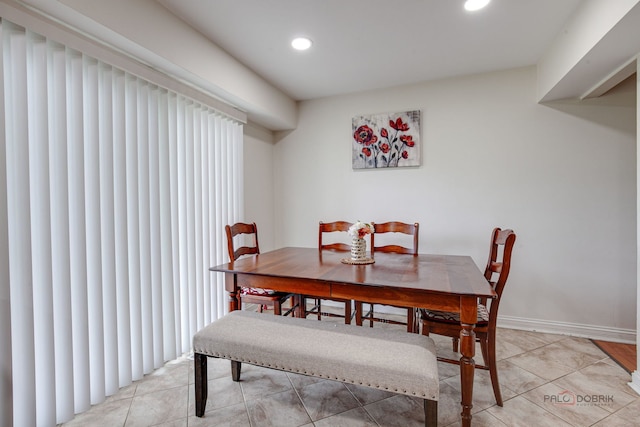 552 Arbor Gate Ln, Buffalo Grove, IL 60089 - dining space with recessed lighting and light tile patterned floors