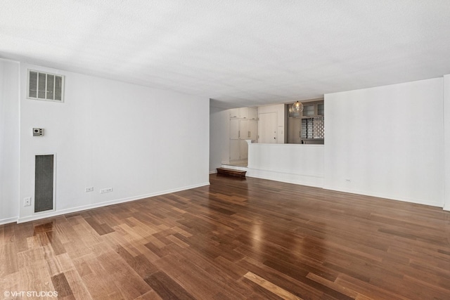 230 E Ontario St Unit 2305, Chicago, IL 60611 - unfurnished living room featuring wood finished floors and baseboards