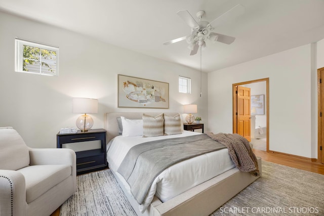 1962 Highbury Ln, Aurora, IL 60502 - bedroom with light wood-style floors, connected bathroom, and ceiling fan