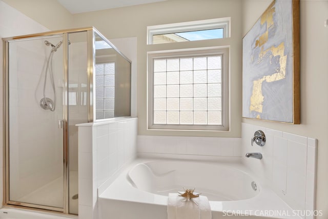 1962 Highbury Ln, Aurora, IL 60502 - bathroom featuring healthy amount of natural light, a bath, and a stall shower
