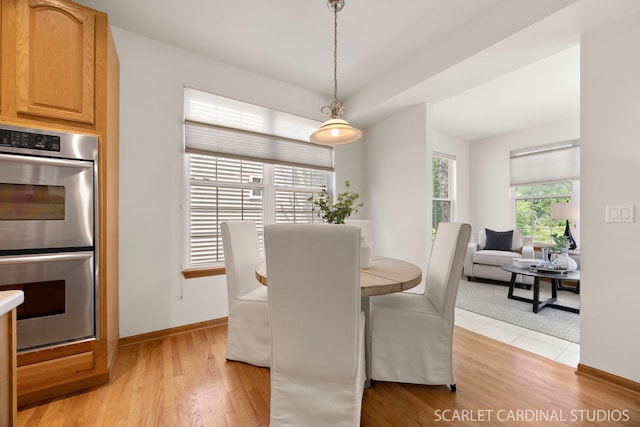 1962 Highbury Ln, Aurora, IL 60502 - dining space featuring light wood-type flooring and baseboards