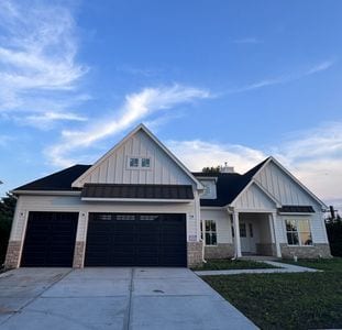 25136 Thornberry Dr Unit 25136, Plainfield, IL 60544 - modern farmhouse featuring board and batten siding, a garage, and driveway