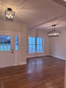 25136 Thornberry Dr Unit 25136, Plainfield, IL 60544 - entrance foyer with a chandelier and wood finished floors