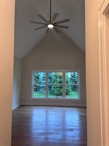 25136 Thornberry Dr Unit 25136, Plainfield, IL 60544 - additional living space featuring wood finished floors, a ceiling fan, and vaulted ceiling