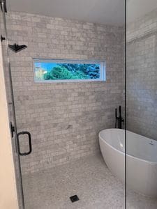 25136 Thornberry Dr Unit 25136, Plainfield, IL 60544 - full bathroom with a shower stall, a soaking tub, and tile walls