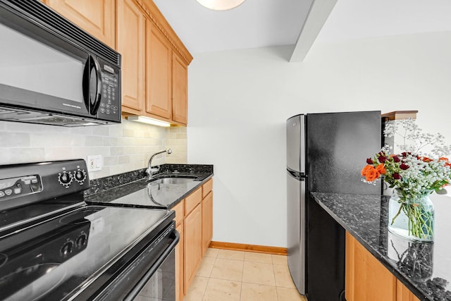 1050 W Columbia Ave Unit 3F, Chicago, IL 60626 - kitchen featuring black appliances, decorative backsplash, dark stone countertops, light tile patterned flooring, and light brown cabinetry