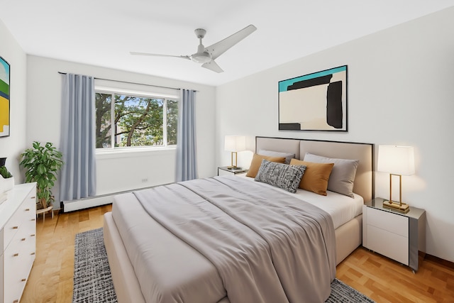 1050 W Columbia Ave Unit 3F, Chicago, IL 60626 - bedroom with ceiling fan and light wood finished floors