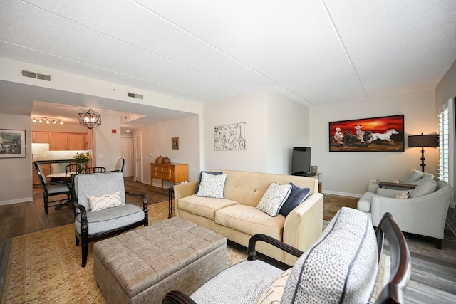 570 Crescent Blvd Unit 307, Glen Ellyn, IL 60137 - living area featuring wood finished floors and a chandelier