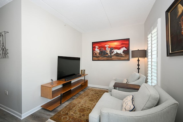 570 Crescent Blvd Unit 307, Glen Ellyn, IL 60137 - living room with wood finished floors and baseboards