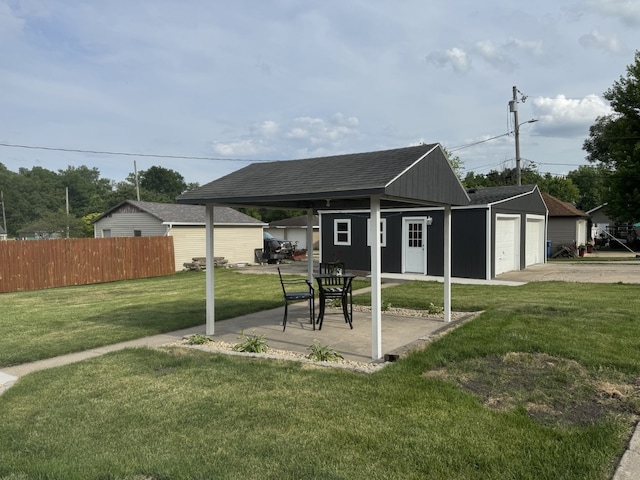 401 E 1st St, Oglesby, IL 61348 - view of yard featuring an outdoor structure