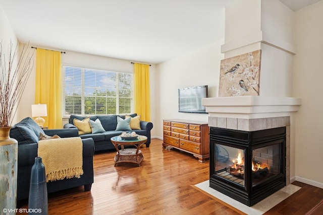 2396 Oakfield Ct, Aurora, IL 60503 - living room with a multi sided fireplace and hardwood / wood-style floors