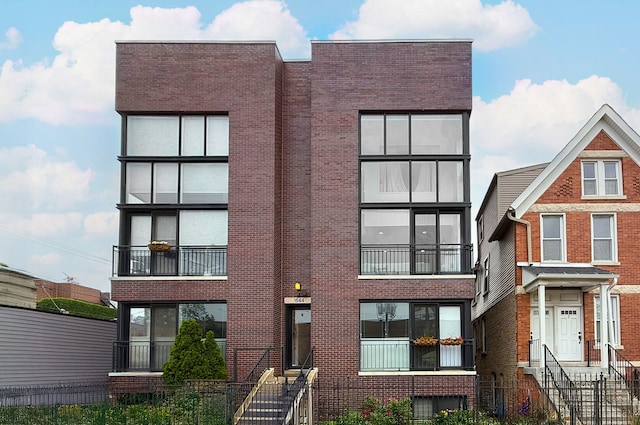 1644 W Blackhawk St Unit 2E, Chicago, IL 60622 - view of front of house with brick siding and entry steps