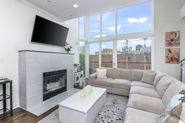 1644 W Blackhawk St Unit 2E, Chicago, IL 60622 - living area with wood finished floors, a tile fireplace, and recessed lighting