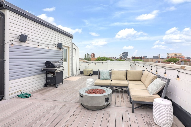 1644 W Blackhawk St Unit 2E, Chicago, IL 60622 - wooden deck with an outdoor living space with a fire pit and grilling area