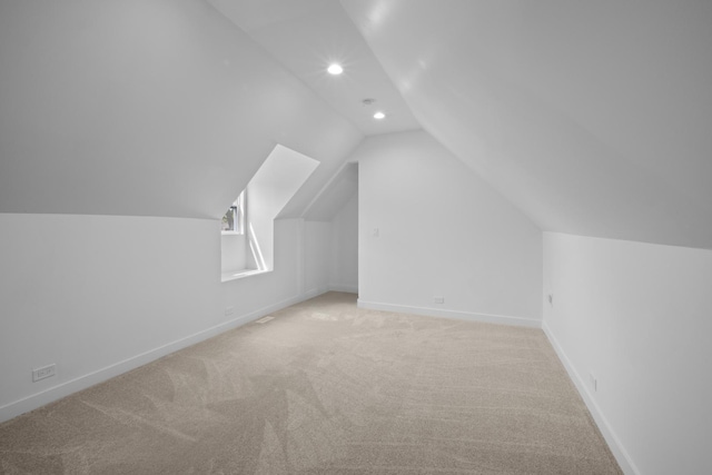 8317 S Constance Ave, Chicago, IL 60617 - bonus room featuring recessed lighting, vaulted ceiling, and light colored carpet