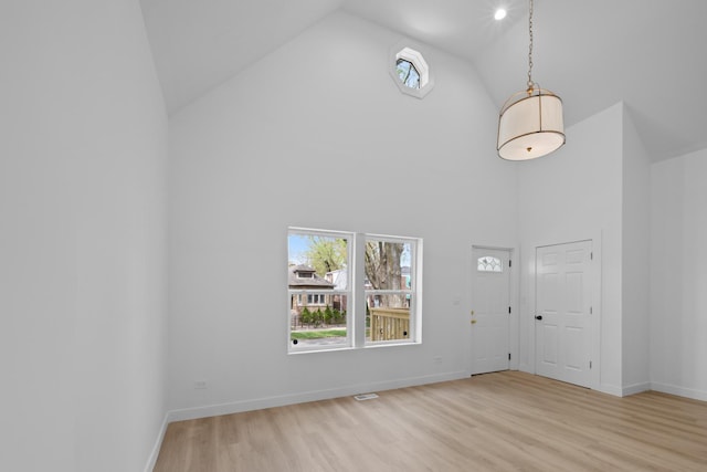 8317 S Constance Ave, Chicago, IL 60617 - foyer featuring high vaulted ceiling and light wood-style floors