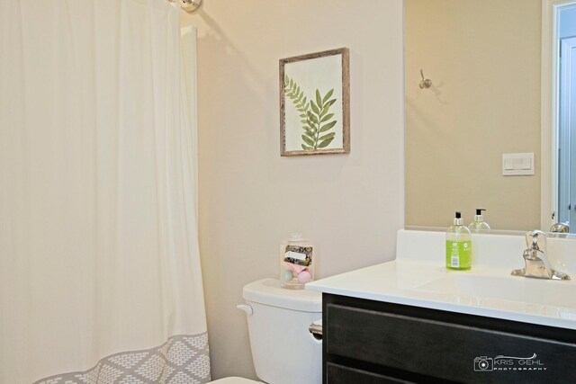 6650 Linden Trl Unit B, Wonder Lake, IL 60097 - bathroom featuring toilet and vanity