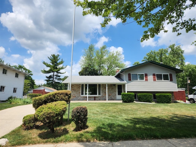 624 Maple Ave, Lisle, IL 60532 - tri-level home with a front yard and stone siding