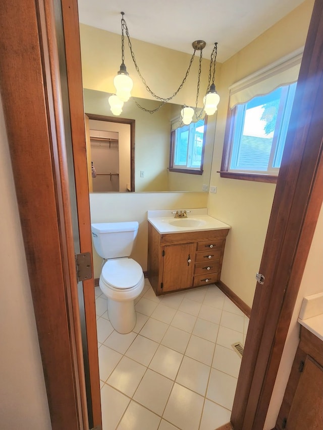 624 Maple Ave, Lisle, IL 60532 - half bath with vanity and tile patterned flooring