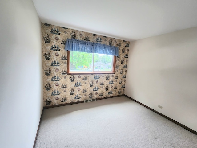 624 Maple Ave, Lisle, IL 60532 - unfurnished room with baseboards and carpet flooring
