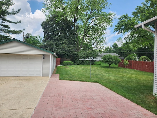 624 Maple Ave, Lisle, IL 60532 - view of grassy yard featuring an outdoor structure and a garage