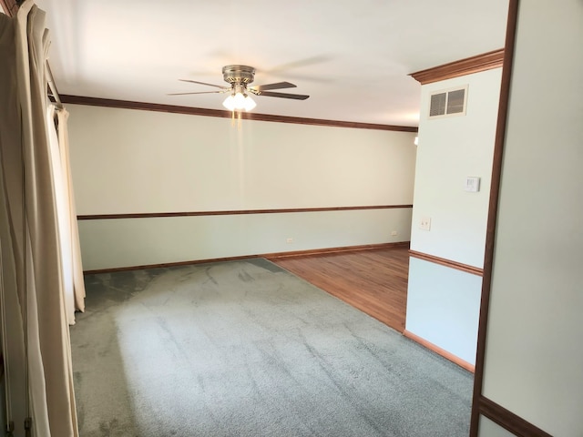 624 Maple Ave, Lisle, IL 60532 - carpeted empty room featuring a ceiling fan and crown molding