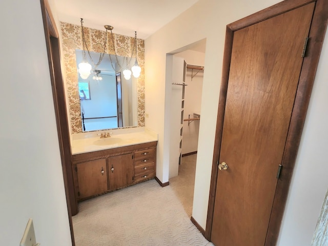 624 Maple Ave, Lisle, IL 60532 - bathroom with vanity and a spacious closet
