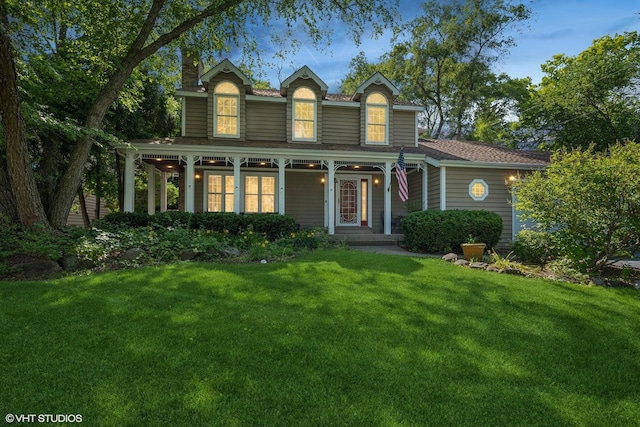 42 N Holly Ave, Fox Lake, IL 60020 - view of front of property featuring a front yard and a porch