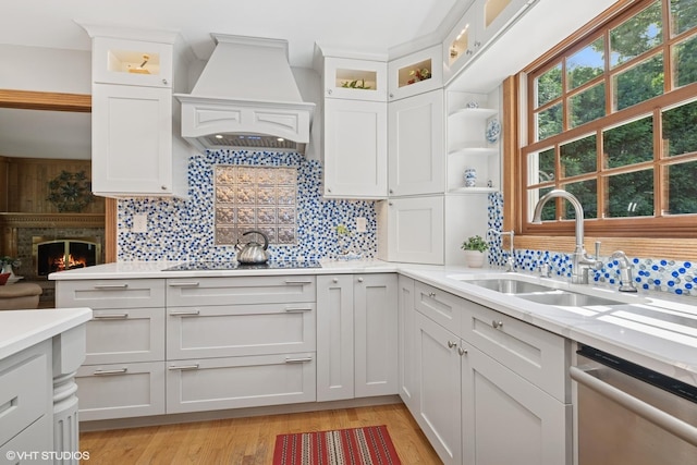 42 N Holly Ave, Fox Lake, IL 60020 - kitchen with dishwasher, custom range hood, black electric stovetop, and decorative backsplash