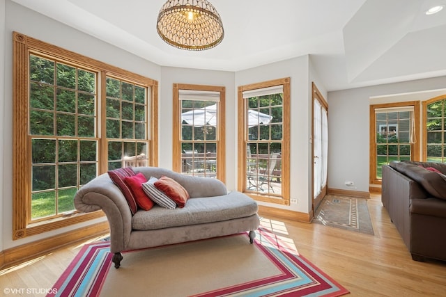 42 N Holly Ave, Fox Lake, IL 60020 - doorway to outside featuring light wood-style floors and a chandelier