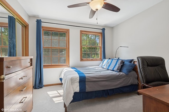 42 N Holly Ave, Fox Lake, IL 60020 - bedroom with light colored carpet and ceiling fan